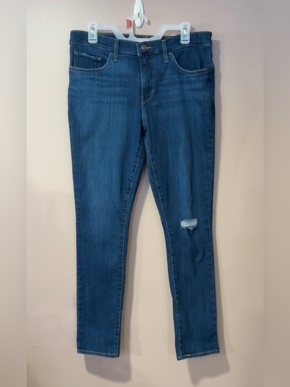 Levi’s 311 Women’s Mid-Blue Shaping Skinny Jeans with Distressed Knee
